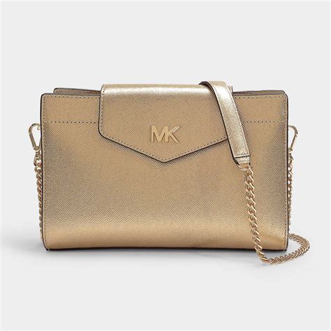 michael kors mk cream and gold crossbody|Michael Kors gold crossbody bag.